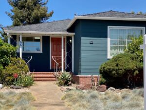 House painting services Chausse painting has painted a house teal