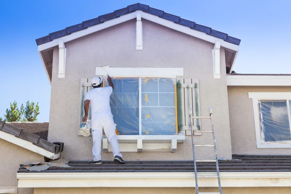 depositphotos_61734427-stock-photo-house-painter-painting-the-trim